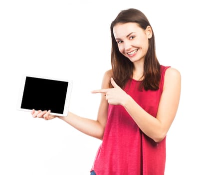 Smiling woman holding and showing the blank screen of an electronic tablet, isolated on white