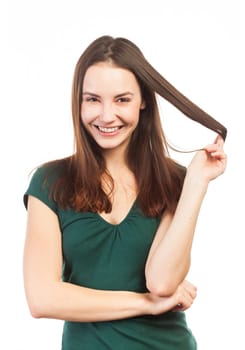 Portrait of an attractive and smiling woman, isolated on white