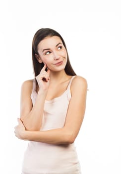 Young brunette looking up at copy space, isolated on white