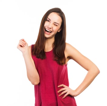 Portrait of a winking young woman, isolated on white