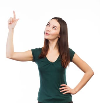 Cheerful woman pointing up at copy space, isolated on white