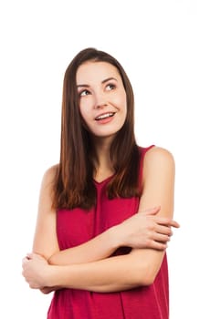 Pretty woman looking up at copy space, on white background