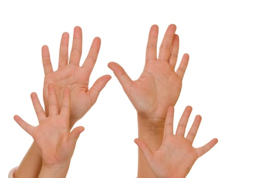 Two pairs of hands held up against a white background.