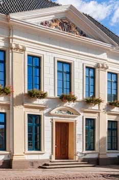 Esens,Germany - October 05,2016: Side view of the entrance portal of the town hall in Esens.