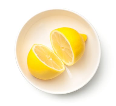 lemon in bowl isolated on white background. top view