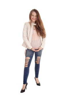 A portrait image of a beautiful young woman in jeans and a white .leather jacket standing isolated for white background.