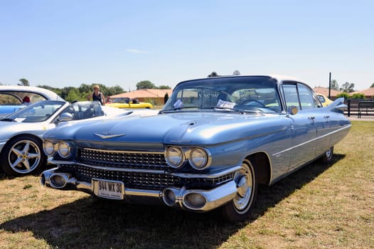 1958 Cadillac de Ville section shown in a vintage car rally