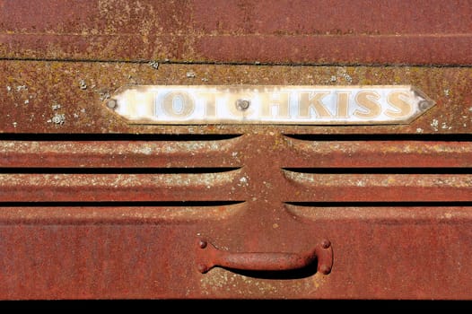 a rusty old truck abandoned in the French countryside