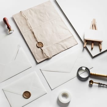 Photo of blank vintage stationery set on paper background. Mock up for branding identity. ID template.