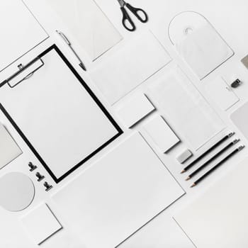 Business brand template on paper background. Blank corporate stationery set.