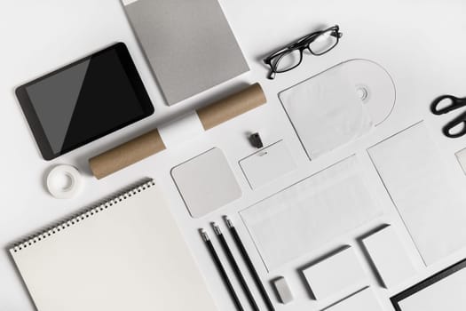 Blank stationery set on paper background. Corporate identity template. Responsive design mockup. Top view.
