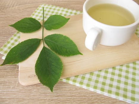 Boiled tea with elderberry leaves