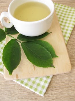 Boiled tea with elderberry leaves