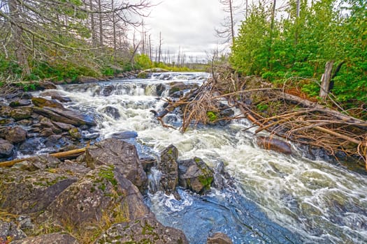 Roaring Cascade in the North Woods on Jasper Lake in the Boudnary Waters of Minnesota