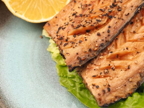 Tasty smoked mackerel garnished with pepper corns