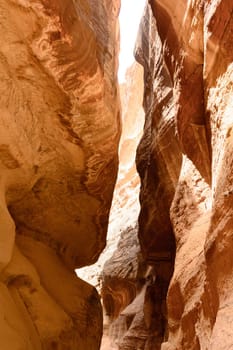 The Siq - stone gallery to the hidden city of Petra, Jordan. UNESCO World Heritage Site