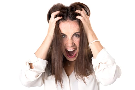 Angry casual young woman isolated in a white background
