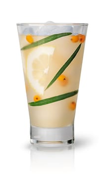 Lemonade with sea buckthorn and lemon. Ice cubes in a glass covered with dew. Isolated on white background.