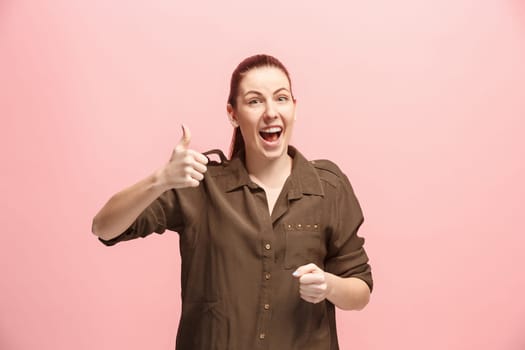 I am ok. Happy business woman, sign ok, smiling, isolated on trendy pink studio background. Beautiful female half-length portrait. Emotional woman. Human emotions, facial expression concept. Front