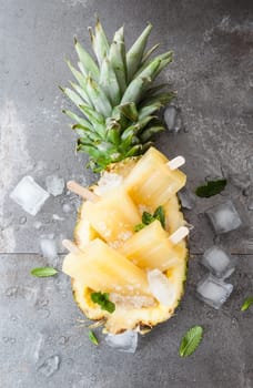 Homemade popsicles with fresh pineapple