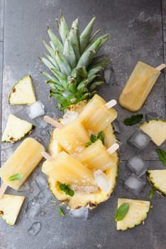 Homemade popsicles with fresh pineapple