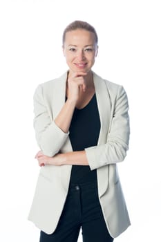 Full body portrait of casualy dressed,cheerful, beautiful, smart, young businesswoman in standing against white background.