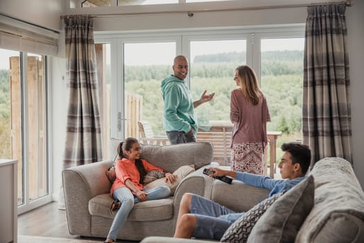 Father talking to his family, discussing what to do while on vacation.