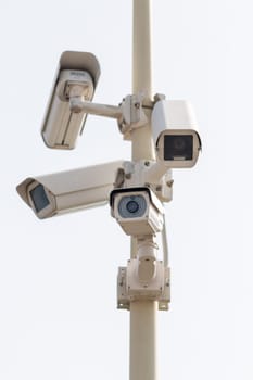 Group of four cameras on a pole