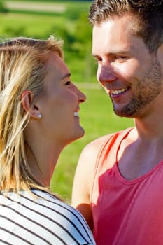 Young,happy couple out in nature