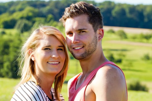 Young,happy couple out in nature