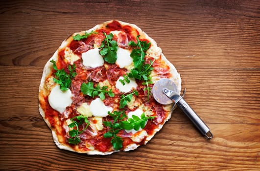 Delicious italian pizza served on wooden table