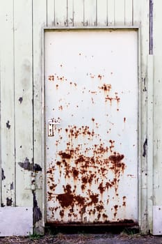 old shelter with rotten door. full frame image