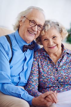 Elegantly dressed couple of pensioners