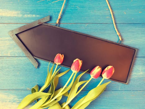 Colorful springtime background with beautiful tulips, seasonal background