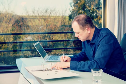 young business man at his desk working