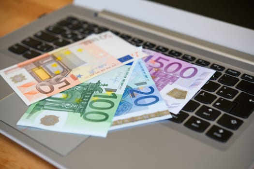 still life- computer keyboard with euro bank notes