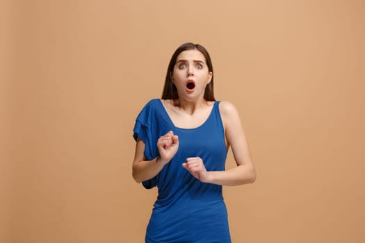 I'm afraid. Fright. Portrait of the scared woman. Business woman standing isolated on trendy pastel studio background. Female half-length portrait. Human emotions, facial expression concept. Front view