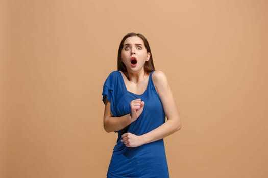 I'm afraid. Fright. Portrait of the scared woman. Business woman standing isolated on trendy pastel studio background. Female half-length portrait. Human emotions, facial expression concept. Front view