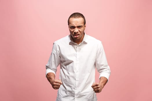Screaming, hate, rage. Crying emotional angry afro man screaming on pink studio background. Emotional, young face. male half-length portrait. Human emotions, facial expression concept. Trendy colors