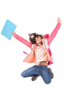 Young girl student jumping isolated in white