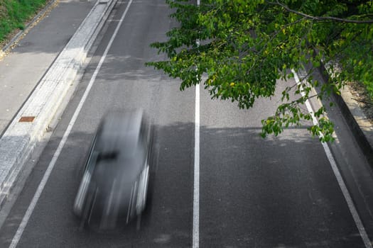 Motion blur of cars in aerial view over the road. (Speed limits - Infractions - Speed Cameras)