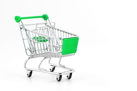 Small metal shopping cart isolated on white background