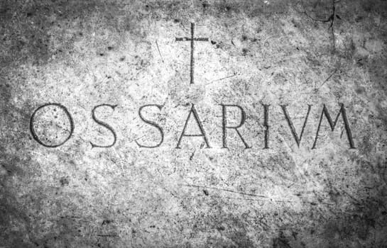 Ossuary cemetery with the engraving in Latin "Ossarium"" (translation from Latin Ossario)"