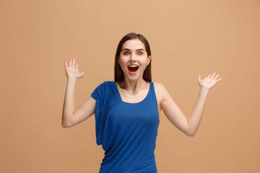 I won. Winning success happy woman celebrating being a winner. Dynamic image of caucasian female model on pastel studio background. Victory, delight concept. Human facial emotions concept. Trendy colors