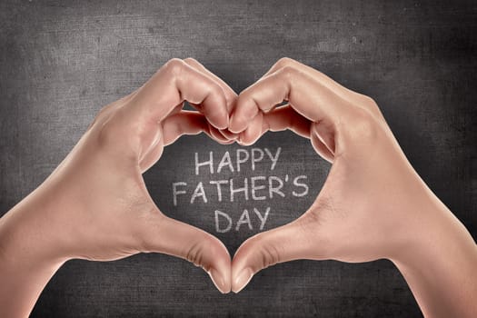 Hands with heart shape with Happy fathers day messages. Fathers day concept