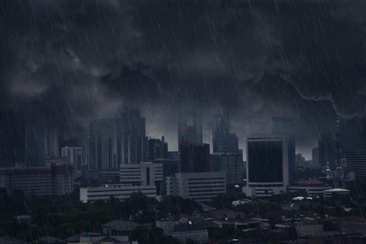 Dark rain cloud with lightning storm in the city