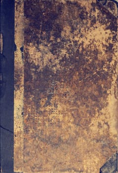Ancient used book cover using as vintage or retro background with space for text or image