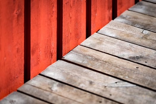 Old building wooden wall with free space for your content. Traditinal color and building material in Norway, Scandinavia, Europe.