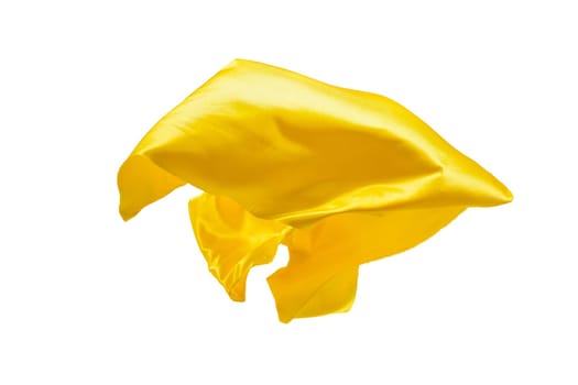 Smooth elegant transparent yellow cloth isolated or separated on white studio background. Texture of flying fabric.
