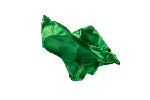 Smooth elegant transparent green cloth isolated or separated on white studio background. Texture of flying fabric.